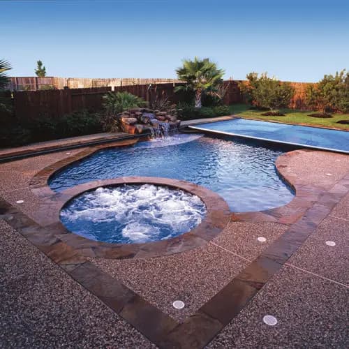 Backyard pool with automatic cover retracted